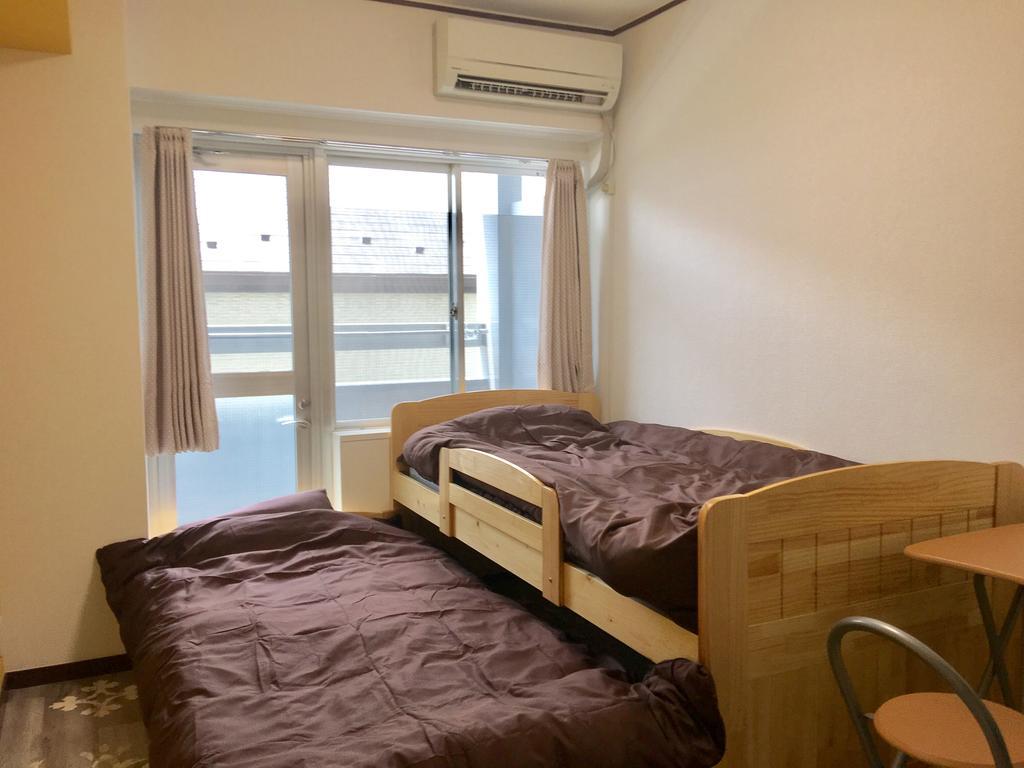 Guesthouse Origami Hiroshima Buitenkant foto